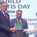 ANTH Director Dr. Areej Neyazi presenting a souvenir to Federal Minister Ahsan Iqbal on World Hepatitis Day 2026